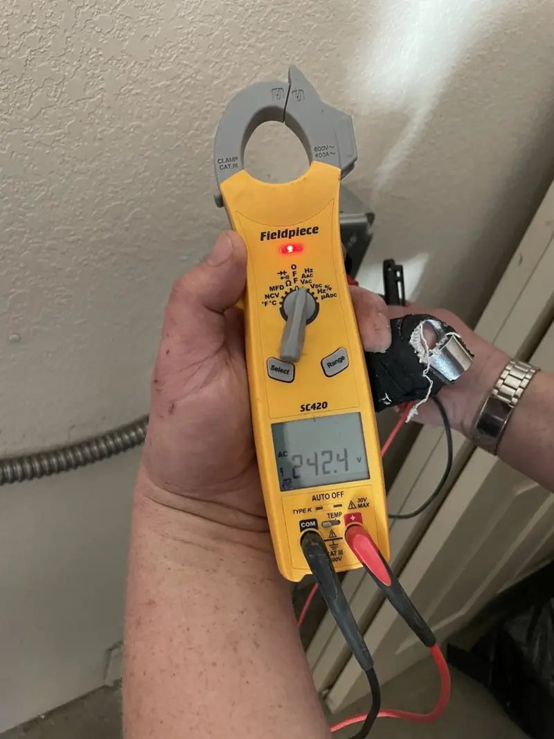 Voltage testing with clamp meter during Ceiling Fan Installation in Wheatland